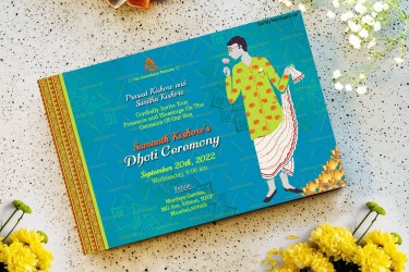 A Fun Blue Theme Invitation Card For Dhoti Function With Golden Mandalas And A Toony Boy Holding A Pink Lotus